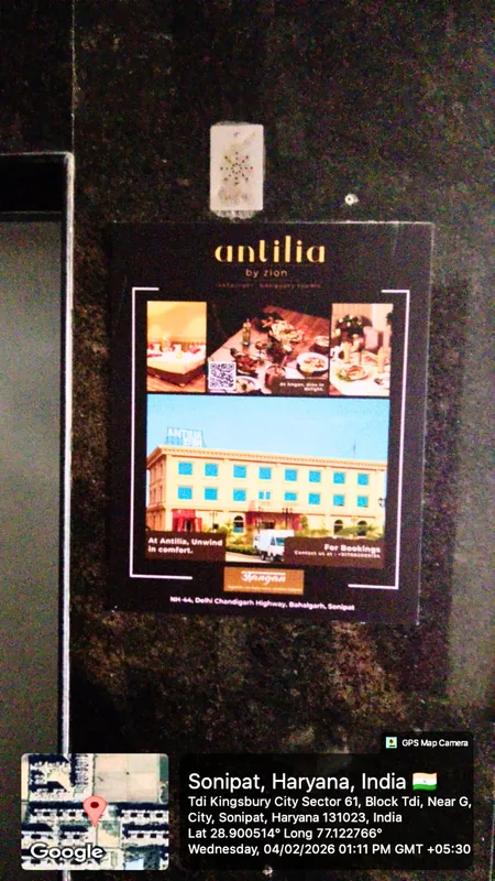 Antilia framed advertisement in a residential lobby