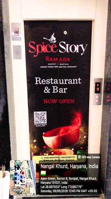Spice Story restaurant lift-door advertising